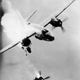 Though Marauder crews suffered the fewest combat losses of any American bomber type, bombing missions were still risky business. Here a B-26 suffers a direct hit by flak over Toulon, France in 1944. (US Air Force)